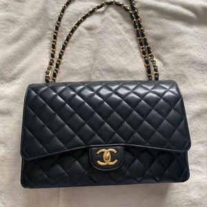 Chanel bag  maxi black  caviar gold hardware